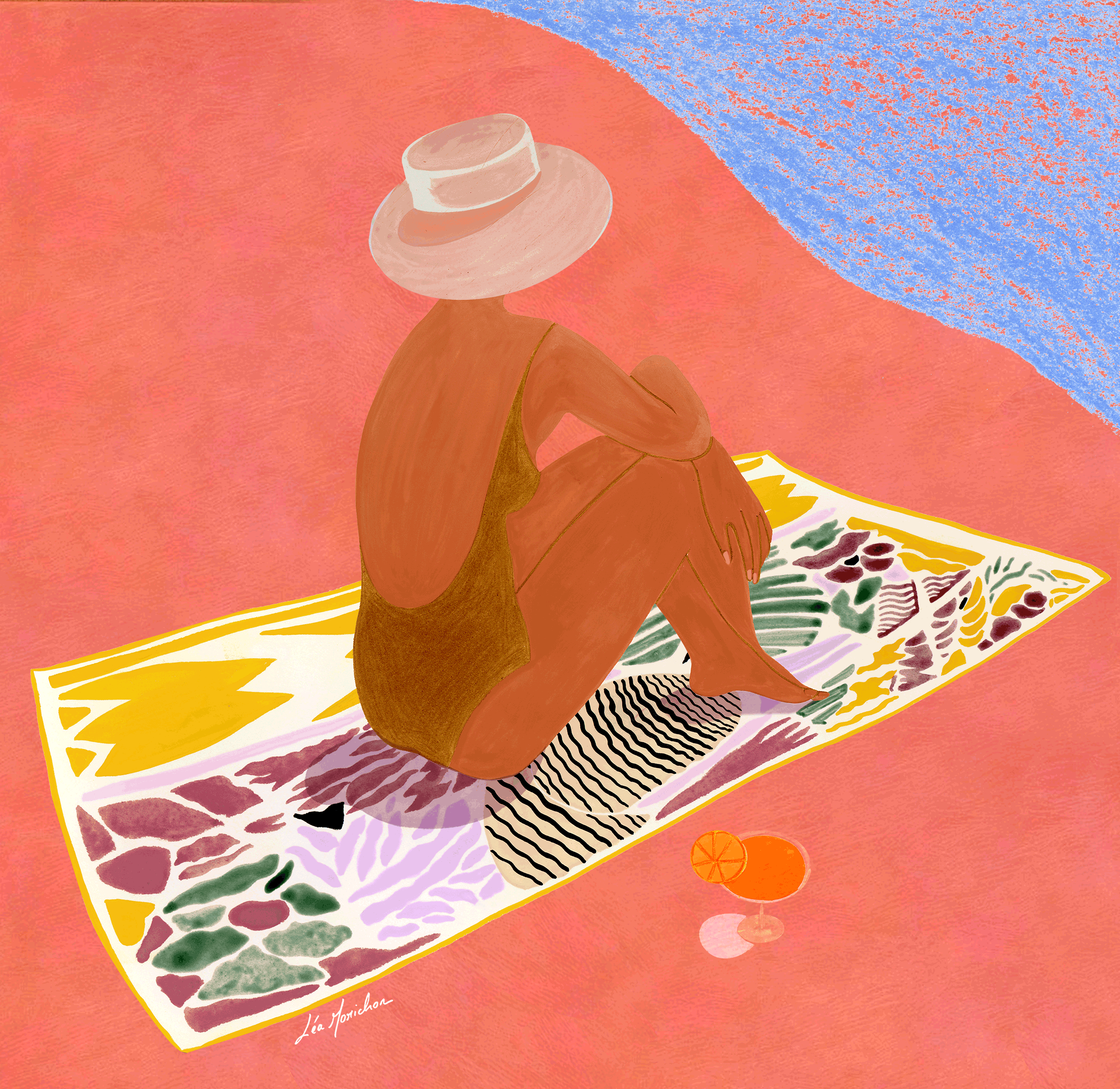 une femme sur une serviette de plage